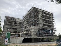 Gebäudeansicht - Rohbaufertigstellung (© künstlin ingenieure)