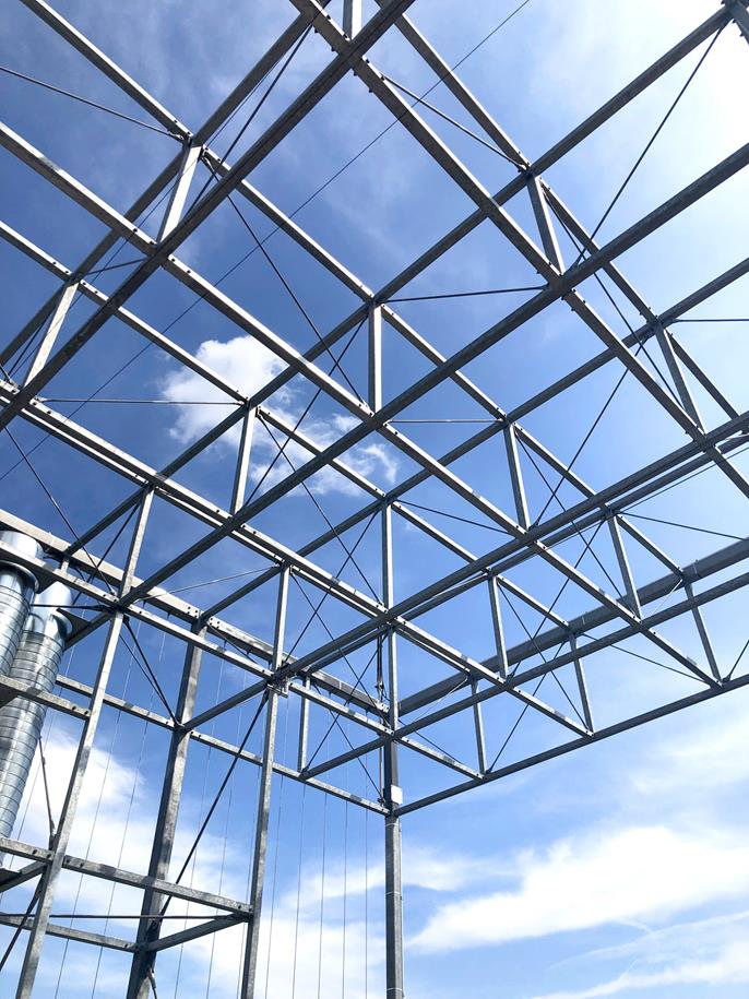 Střecha jako prostorová příhradová konstrukce s přechodem do vertikály (© Bollinger+Grohmann)