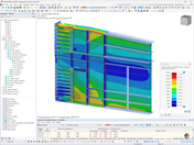 Detailní pohled na spoj ocelového nosníku s nosníkem mostu s vyznačením srovnávacích napětí na povrchu konstrukce.