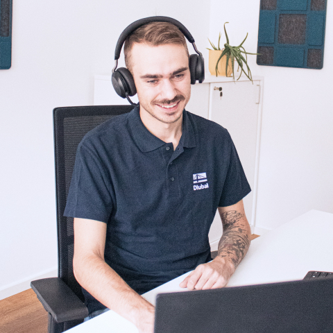 Erik, Mitglied des Vertriebsteams, in einem Porträtfoto.