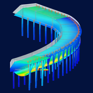 Lawinenschutzgalerie aus Stahlbeton in alpiner Umgebung mit Gebirgskulisse.