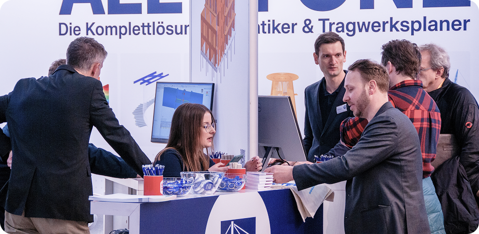 Messestand von Dlubal Software auf der digitalBAU 2026 mit lächelnden Mitarbeitern, die sich mit den Besuchern unterhalten.