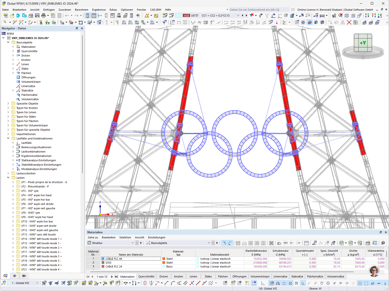 RFEM-Modell der Olympischen Ringe vor dem Eiffelturm in Paris mit Tragkonstruktion und Stahlstäben