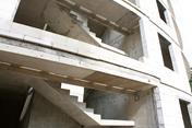 Shell Construction with Reinforced Concrete Stairs