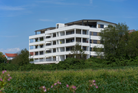 Five-Story Timber Apartment Building with View of Lake Constance (© Conné van d'Grachten)