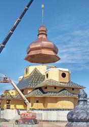 Lifting and Positioning of Dome (© Moses Structural Engineers Inc.)