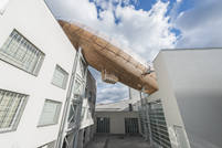 Timber Airship Supported by Two Steel Truss Columns (© Jan Slavík, DOX)