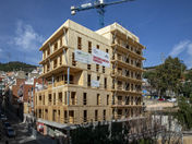 Corner View of "Cirerers" Building Under Construction (© Estudi M103)