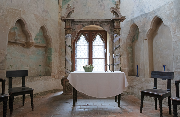 Interior view of the mythical Houska Castle in the Czech Republic with chapel ambiance and eerie details