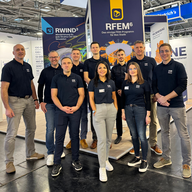 A professional team gathered at BAU 2025 during the exhibition event