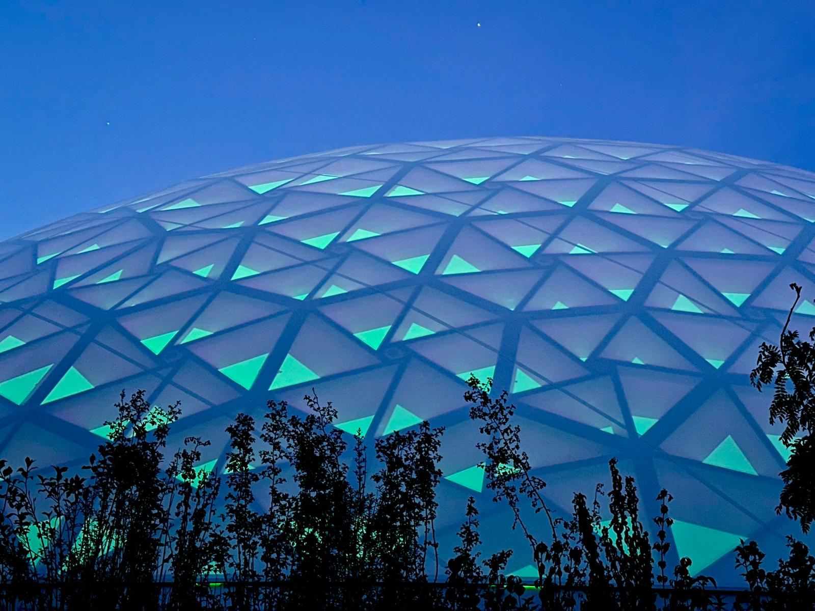 Illuminated night view of the Park Arena dome in Furth im Wald.