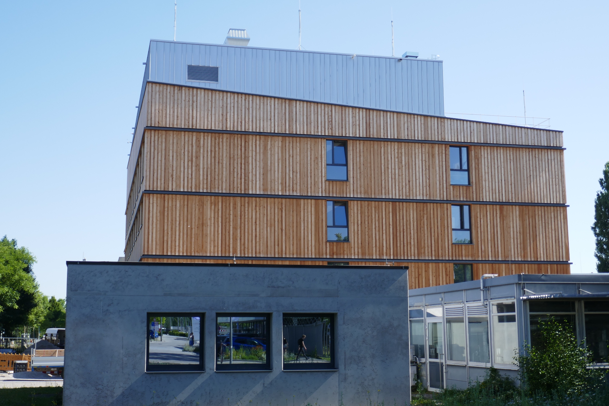 Side view of a modern laboratory building with timber cladding.