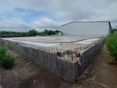 Detailed view of the reinforcement for a foundation slab with focus on the connection area.