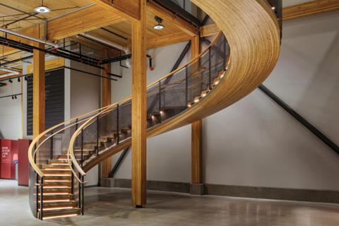 Spiral staircase at the KF Aerospace Centre for Excellence designed by StructureCraft.