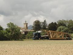 Transportation of a footbridge section by Madergia.