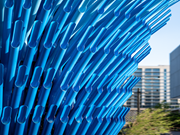 Close-up of aluminum tubes with focus on texture and structure.