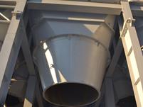 Detailed view of a silo outlet opening in an industrial plant. Photo by PPVP KARKAS.