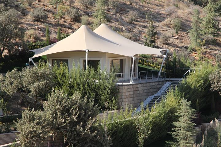 Modern membrane roofing that provides optimal weather protection for an apartment building.