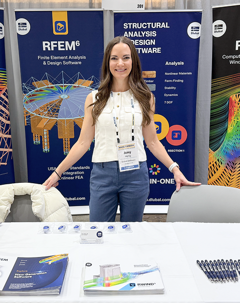 Amy Heilig, PE, CEO of the U.S. branch, presenting at a conference booth.