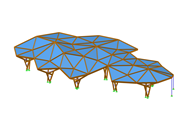 Glued-laminated timber roof structure shows structural details and connections.