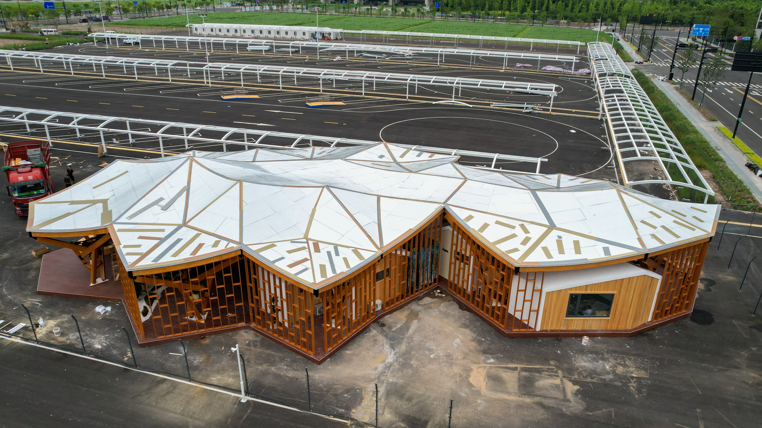 Aerial view of the modern Hangzhou Asian Games Service Center from an aerial view. Architectural highlight in Hangzhou.