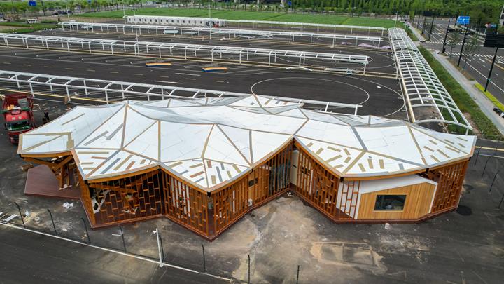 Aerial view of the modern Hangzhou Asian Games Service Center from an aerial view. Architectural highlight in Hangzhou.