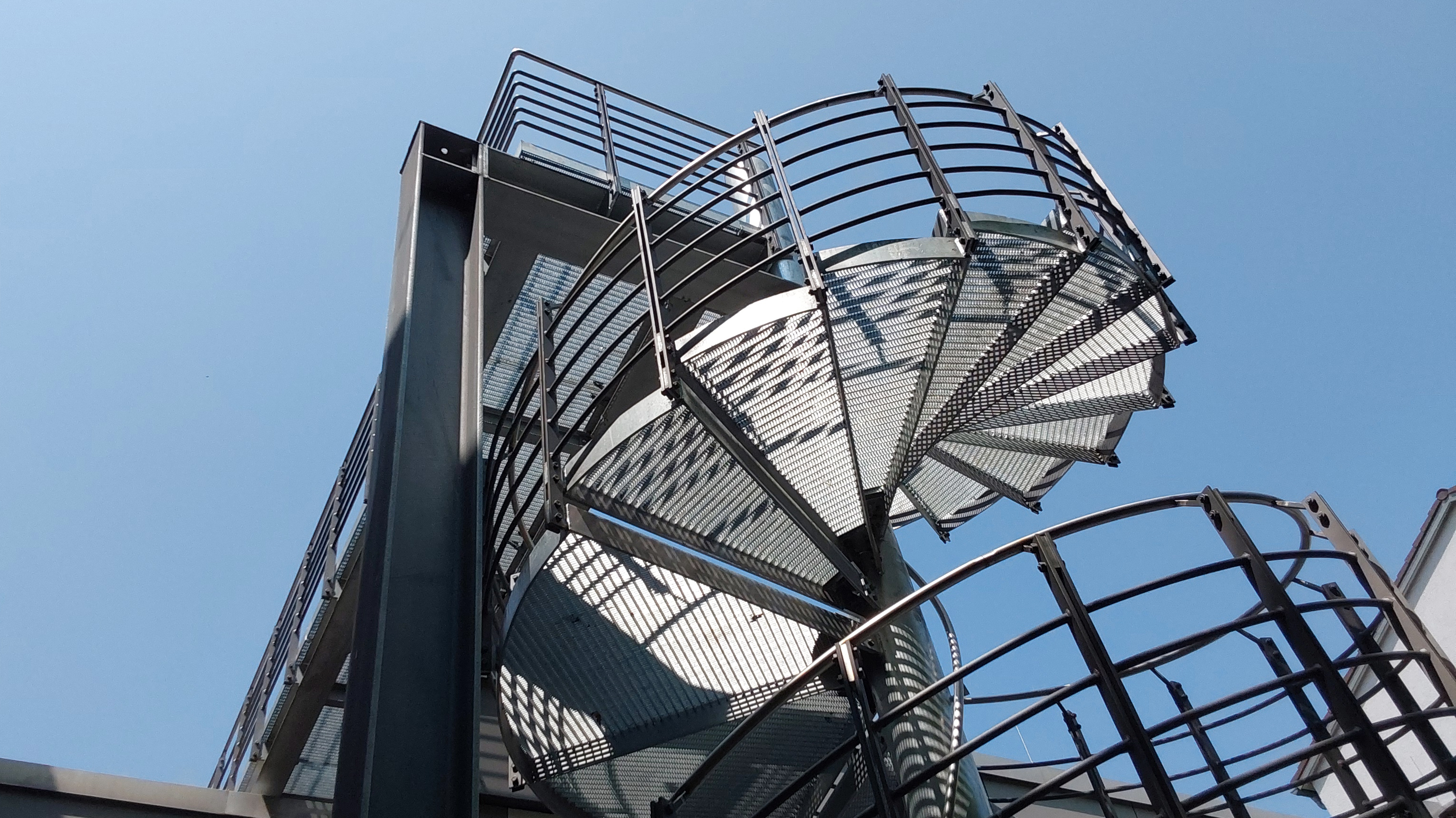 Steel staircase design for an evangelical church project by SAGBO ENGINEERS, showcasing structural engineering techniques.