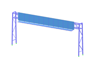 Steel structure of a sign bridge over a road under a clear sky.