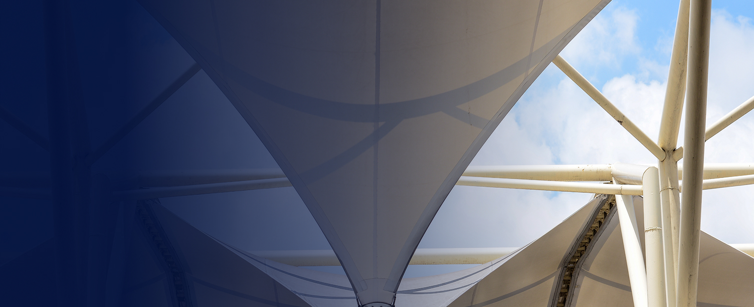 Steel support structures coupled with a complex textile membrane design enhance stability and aesthetic in modern constructions.