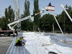 Detail shot of the preparation of a membrane structure for use in architectural projects.