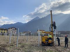 Photovoltaic systems are installed on a roof during the construction phase.