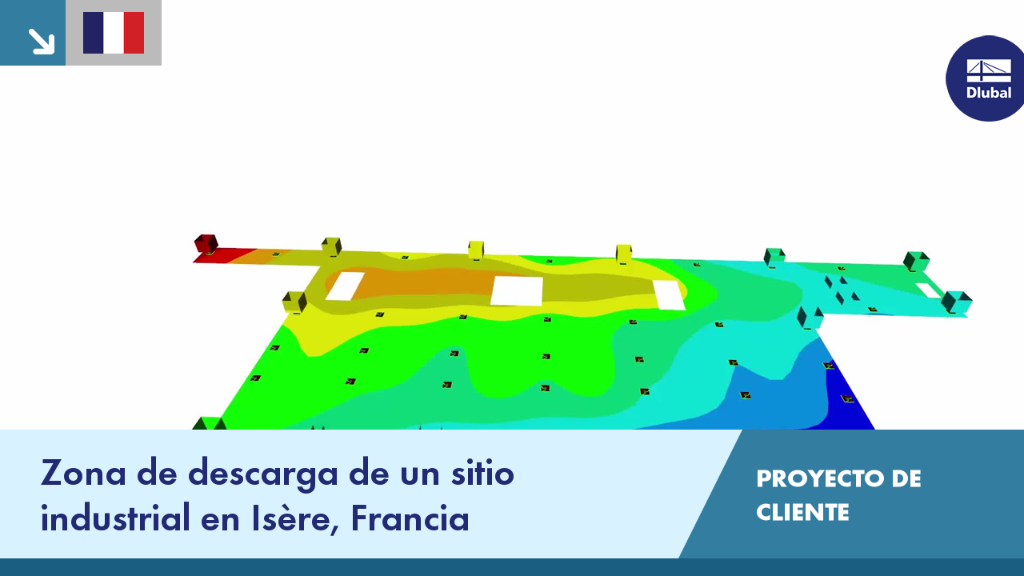 Sitio industrial en Isère con zona de descarga y camiones