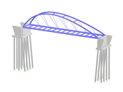 Puente arco oblicuo sobre estribos de hormigón macizo en un entorno natural.