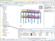 Flecha apunta a cargas en barra de carga superficial en el asistente para cargas en visualización de RFEM 6.