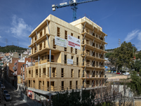 Vue d'angle du bâtiment en construction « Cirerers » (© Estudi M103)