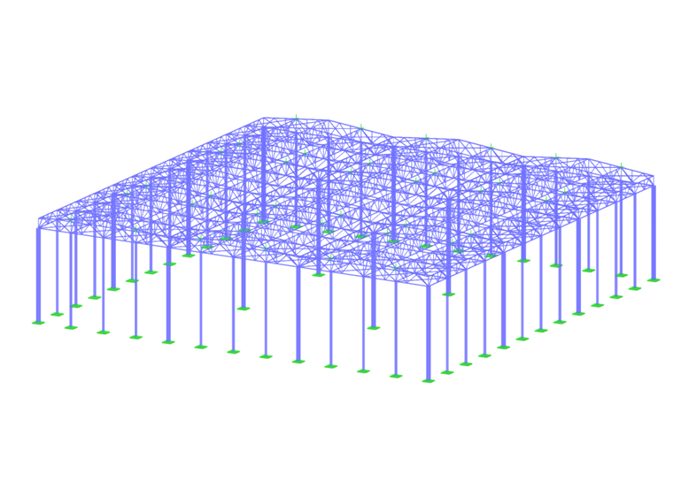 Halle en acier avec des poutres treillis montées, formant une structure porteuse robuste.