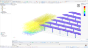L'image affiche une analyse de simulation du vent montrant les schémas d'écoulement de l'air et la répartition des pressions autour d'un modèle de bâtiment.