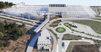 Modello di pianificazione visualizzato del nuovo stabilimento con ponte per pedoni e per tecnologie (centrale) ed il nuovo edificio industriale (in alto) (© Engineering Office Grassl GmbH)