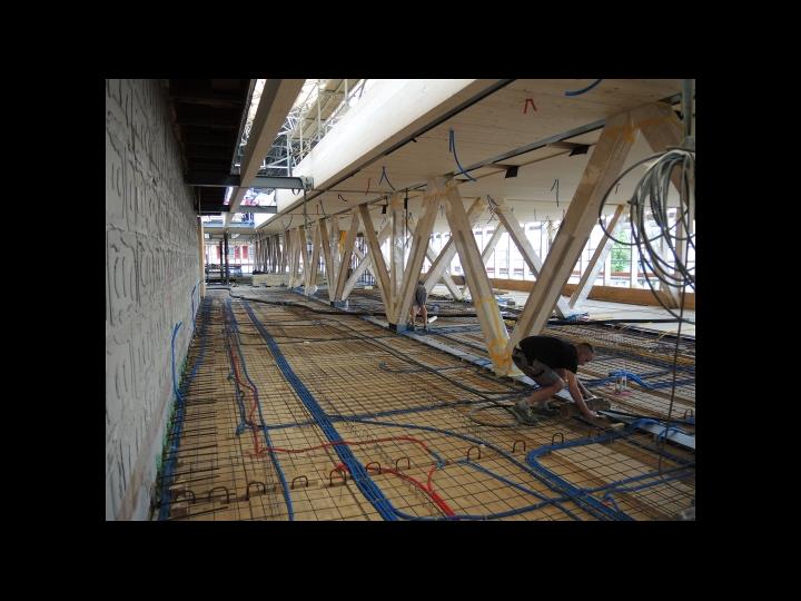 Travature dal pavimento al soffitto con diagonali in acciaio integrate in solette composte legno-calcestruzzo (© Indermühle Bauingenieure)