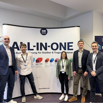 Wydarzenie powitalne dla pracowników podczas Dnia Społeczności Dlubal, demonstrujące pracę zespołową i współpracę.